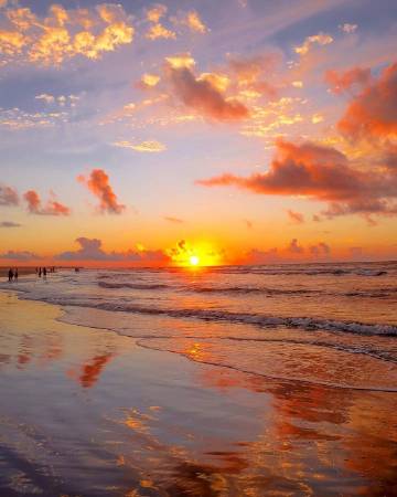 想和你肩并肩的走在海边的日落下。摄影：ferrari_monk